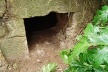 Fig. 12 - Boca de entrada de cisterna do viaduto mais alto, difícil de localizar por encontrar-se coberta pela vegetação.