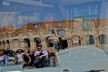 Contamination, cultural heritage reflected in urban bus window, part of the Coliseum<br />Foto Fabio José Martins de Lima 
