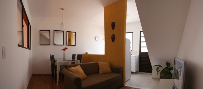 Vista interior da unidade - sala e cozinha
