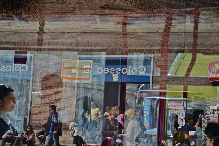 Contamination, cultural heritage reflected in urban bus window, part of the Coliseum<br />Foto Fabio José Martins de Lima 