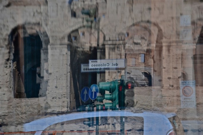 Contamination, cultural heritage reflected in urban bus window, part of the Coliseum<br />Foto Fabio José Martins de Lima 