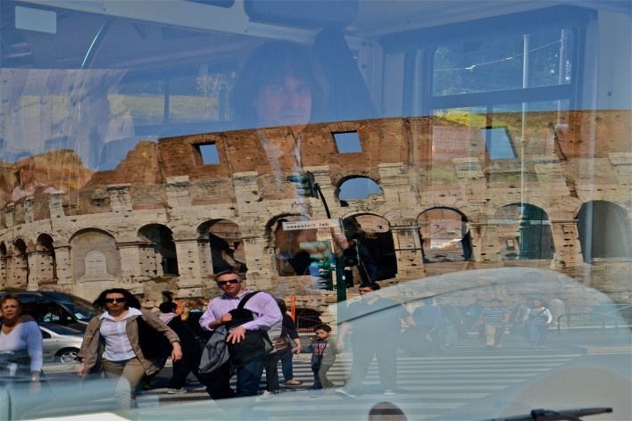 Contamination, cultural heritage reflected in urban bus window, part of the Coliseum<br />Foto Fabio José Martins de Lima 