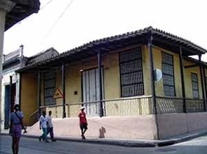 Foto 2: Casa da etapa colonial com fachada de corredor